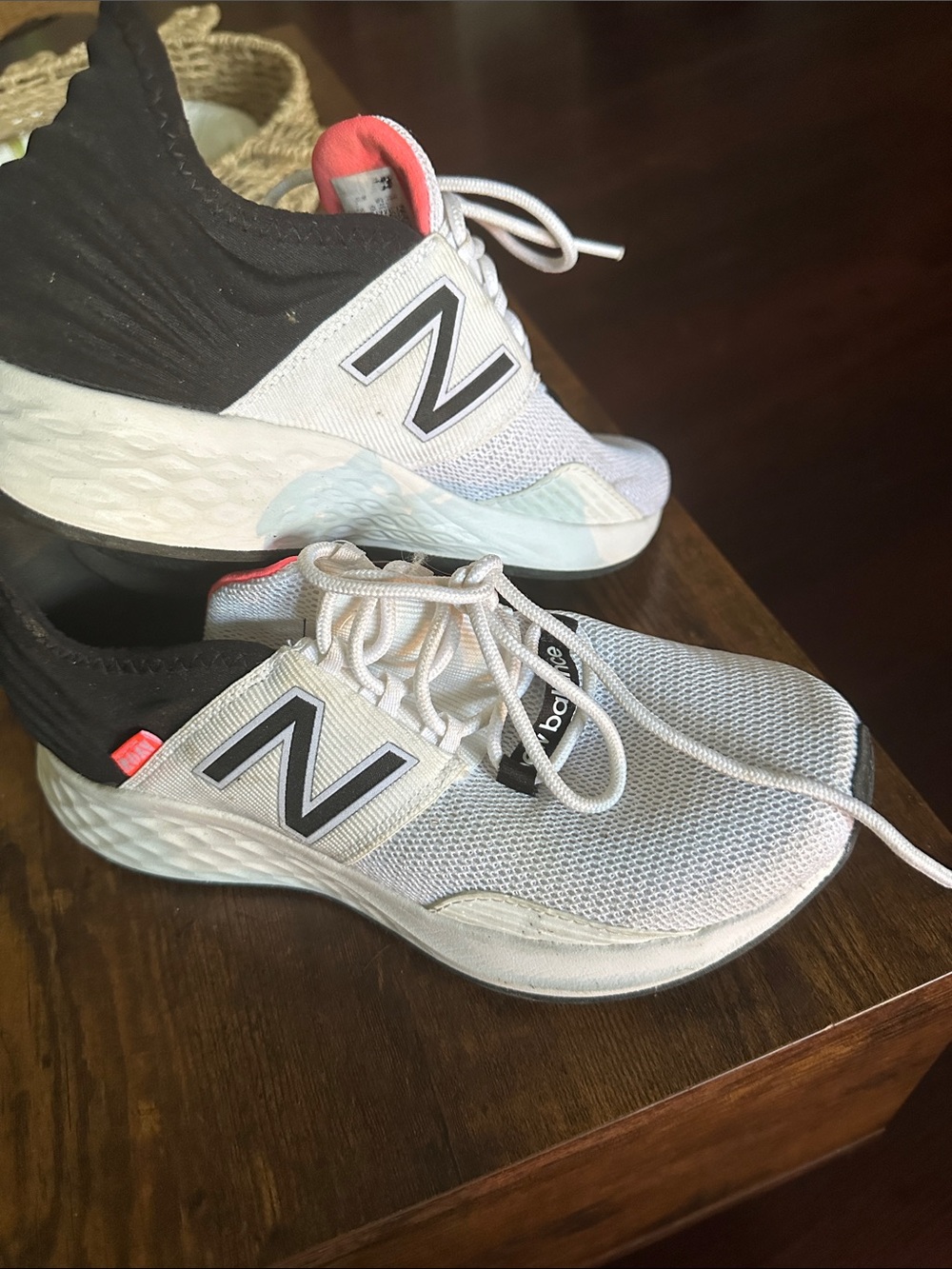 New Balance White and Black Sneakers with Coral Accent